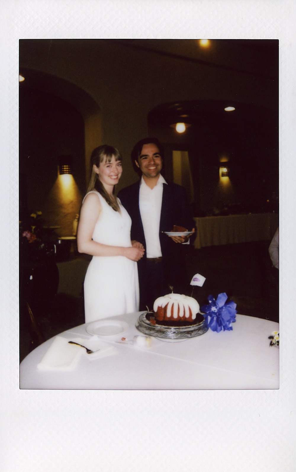 husband and wife with cake